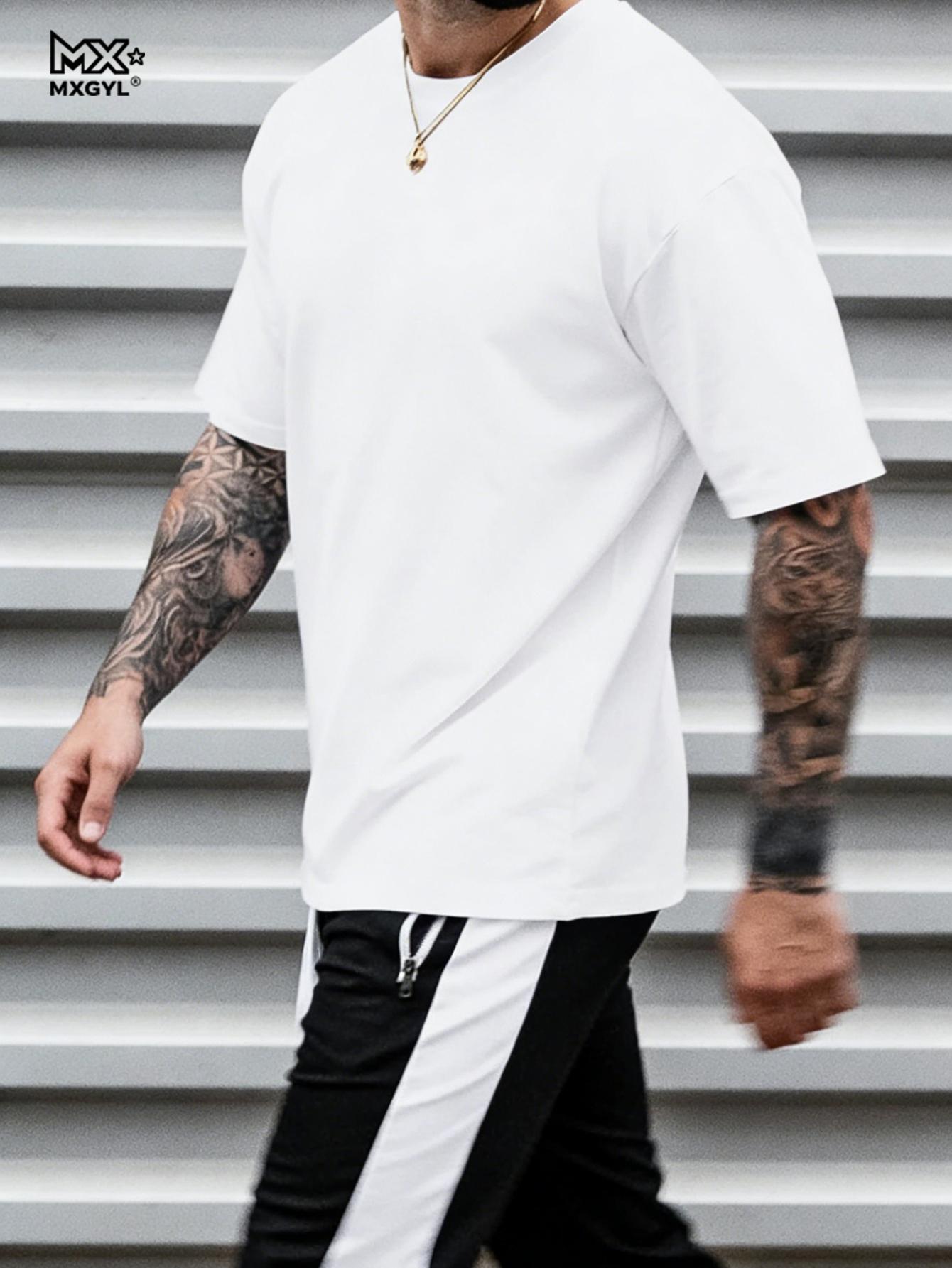 

Summer men s casual sports loose plus size whatever letter printed comfortable round neck short sleeved T-shirt M белый