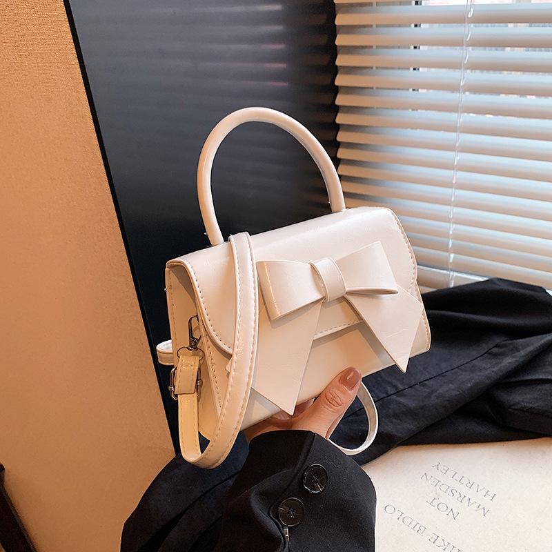 Chic Patent Leather Mini Top Handle Bags with Statement Bow Detail Detachable Crossbody Bag Strap Versatile Party Shoulder Purse