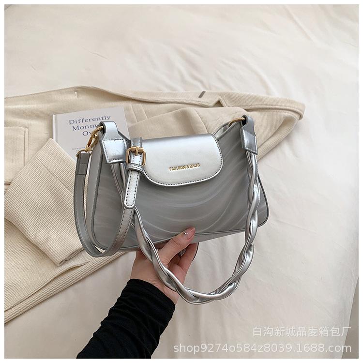 

French shoulder bag woven shoulder strap small bag women s 2025 new armpit bag popular messenger bag delivery серебряный