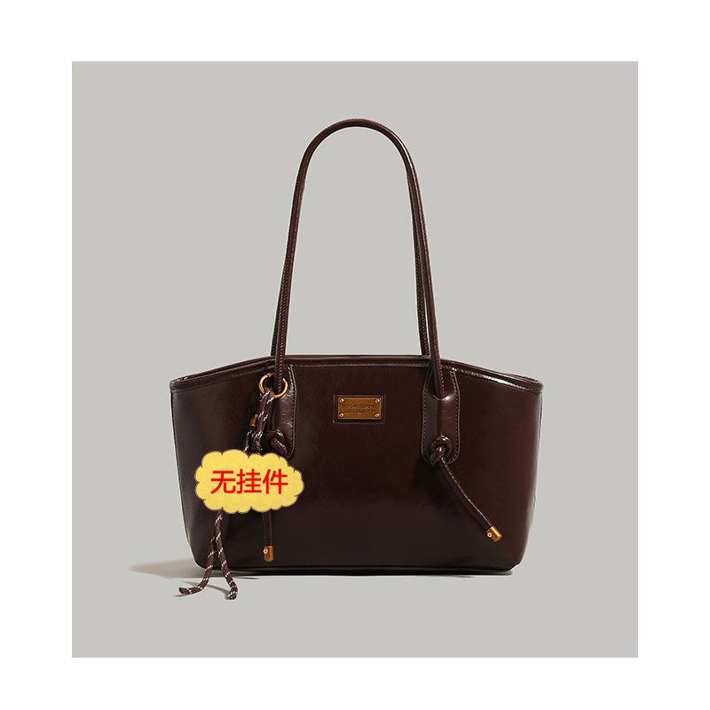 

Autumn and winter retro armpit bag women s 2025 new winter fashion niche versatile large-capacity commuter women s handbag темно-коричневого