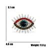 Broche Ojo Europeo y Americano con Pedrería y Acabado de Aceite Goteado - Accesorio de Moda Elegante