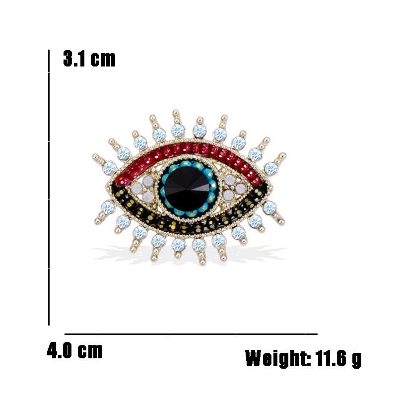 European & American Eye Rhinestone Brooch with Drip Oil Finish - Stylish Fashion Accessory