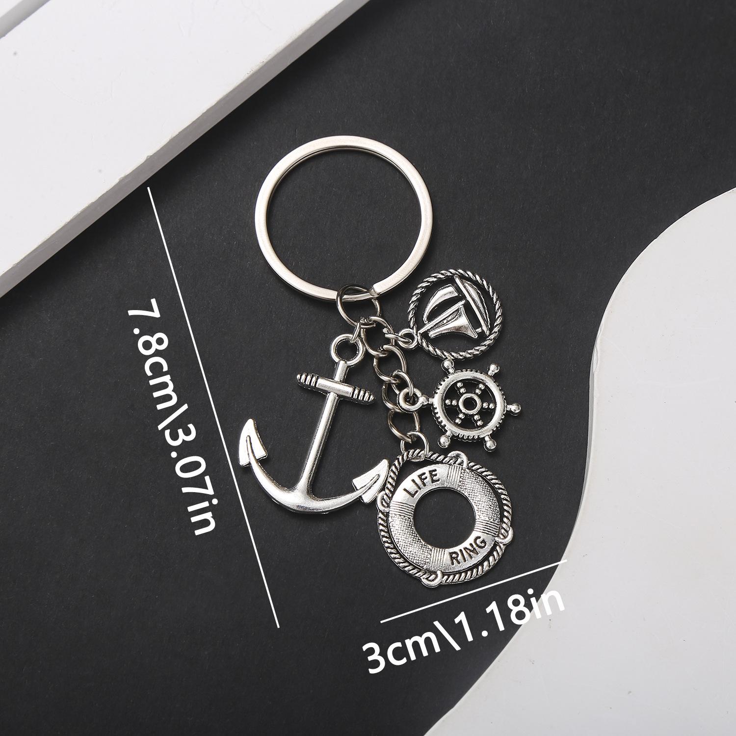 Vintage Silver Nautical Keychain with Ship Wheel, Globe & Lighthouse Pendant