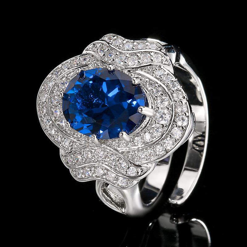 Ювелирное кольцо Медь Позолоченное Ювелирное изделие Инкрустированный красным сапфиром Женский Премиум Легкая роскошь