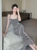 European and American style sexy suspender dress women's early autumn new corrugated abstract tight and thin backless long skirt