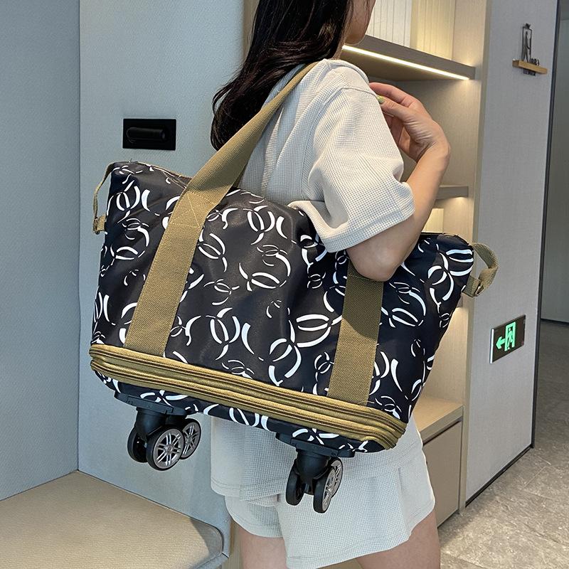 Stylish and personalized design Double-layer expansion portable travel bag with wheels Home moving luggage bag can be set with tie rod