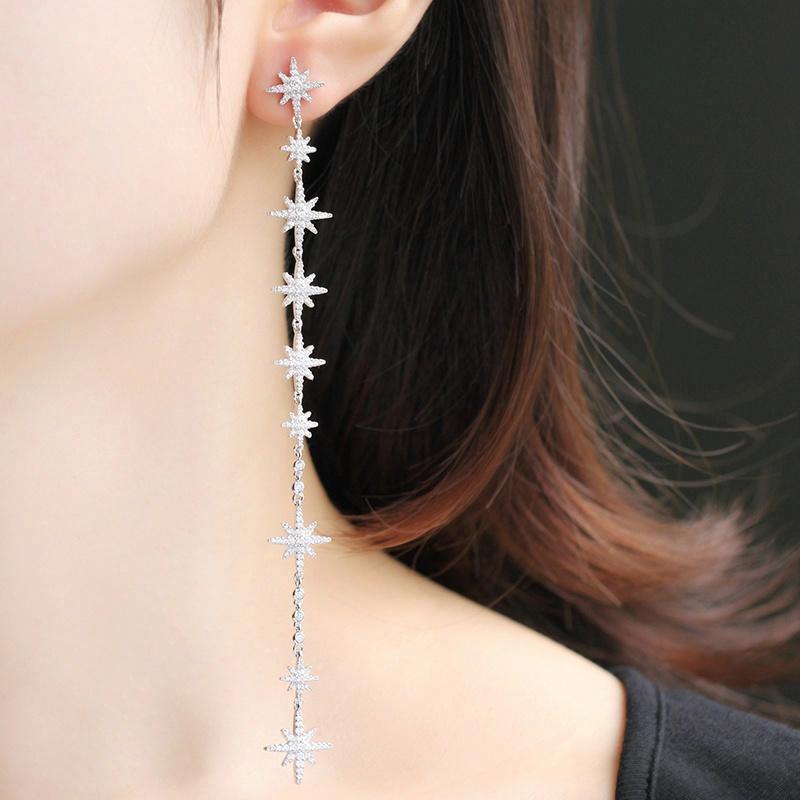 APM Monaco METEORITES/Six-pointed Star Asymmetrical Crystal-set Diamond Shines Fashionable Luxury Niche 925 Silver Earrings for Women AE11523OX