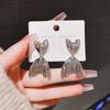 Metal cold wind pleated fishtail shape earrings European and American personalized design earrings simple niche temperament earrings