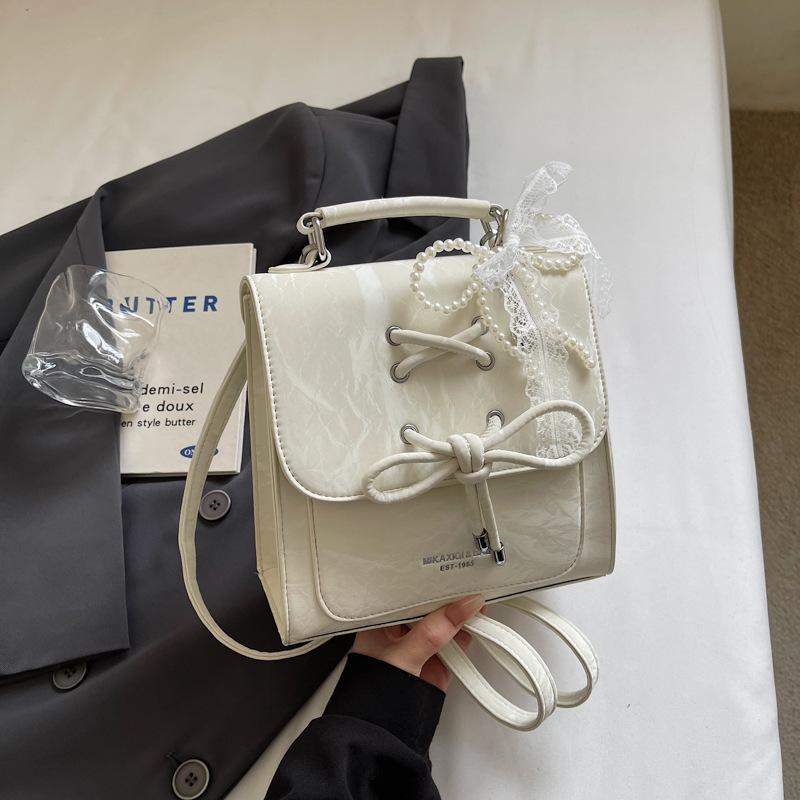 Schoolbag Handsome Mijia Korean Style Beautiful Bow Backpack Women's 1011 New Gentle Cute Crossbody Commuter Single Shoulder Bag