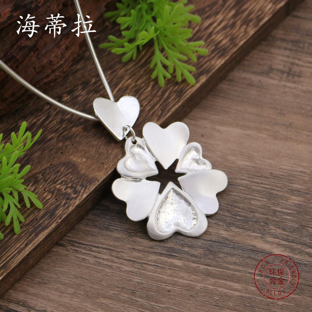 New brushed love flower snake bone chain long pendant, women's exaggerated hollow heart-shaped long necklace