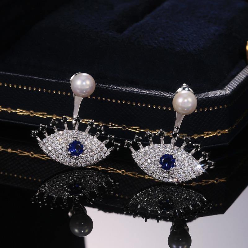 CAOSHI Orecchini Trendy a Forma di Occhio con Perla Sintetica e Zirconia Cubica Piena Scintillante Gioielli Creativi e di Personalità per Feste
