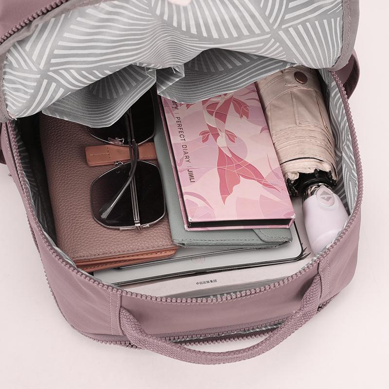 Kompakter Rucksack mit Reißverschluss-Vordertasche Rucksack Damen Reise Leichter Nylon Hochwertige Umhängetasche