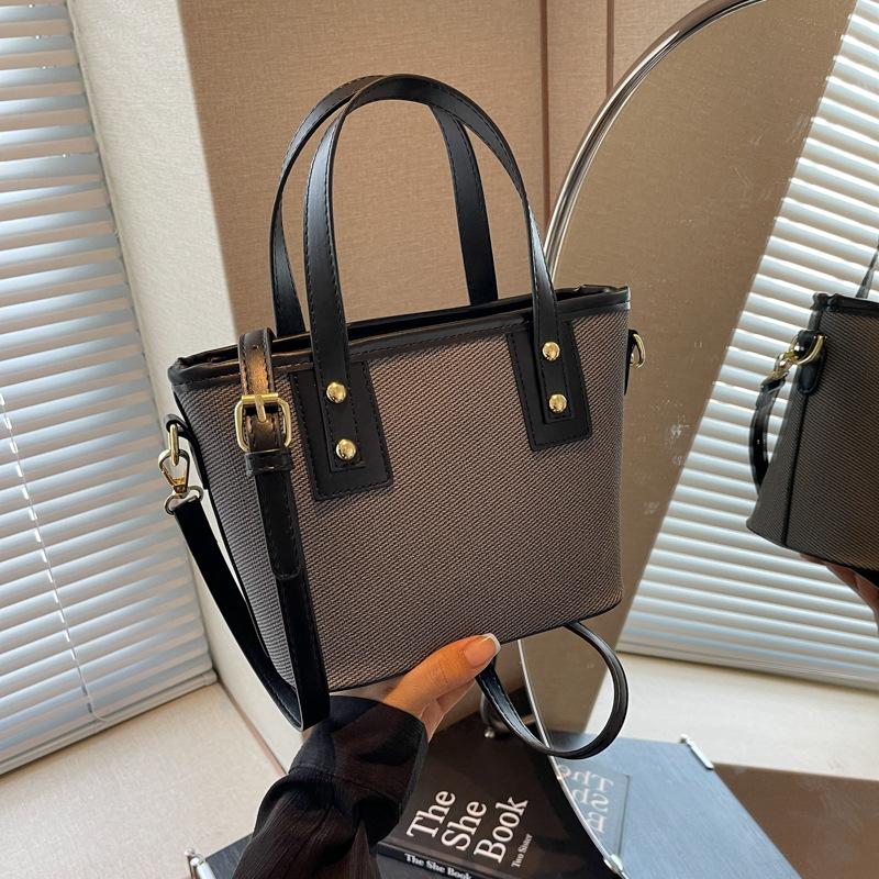 Autumn new fashionable and simple contrasting color vegetable basket bag portable shoulder oblique span trendy women's bag