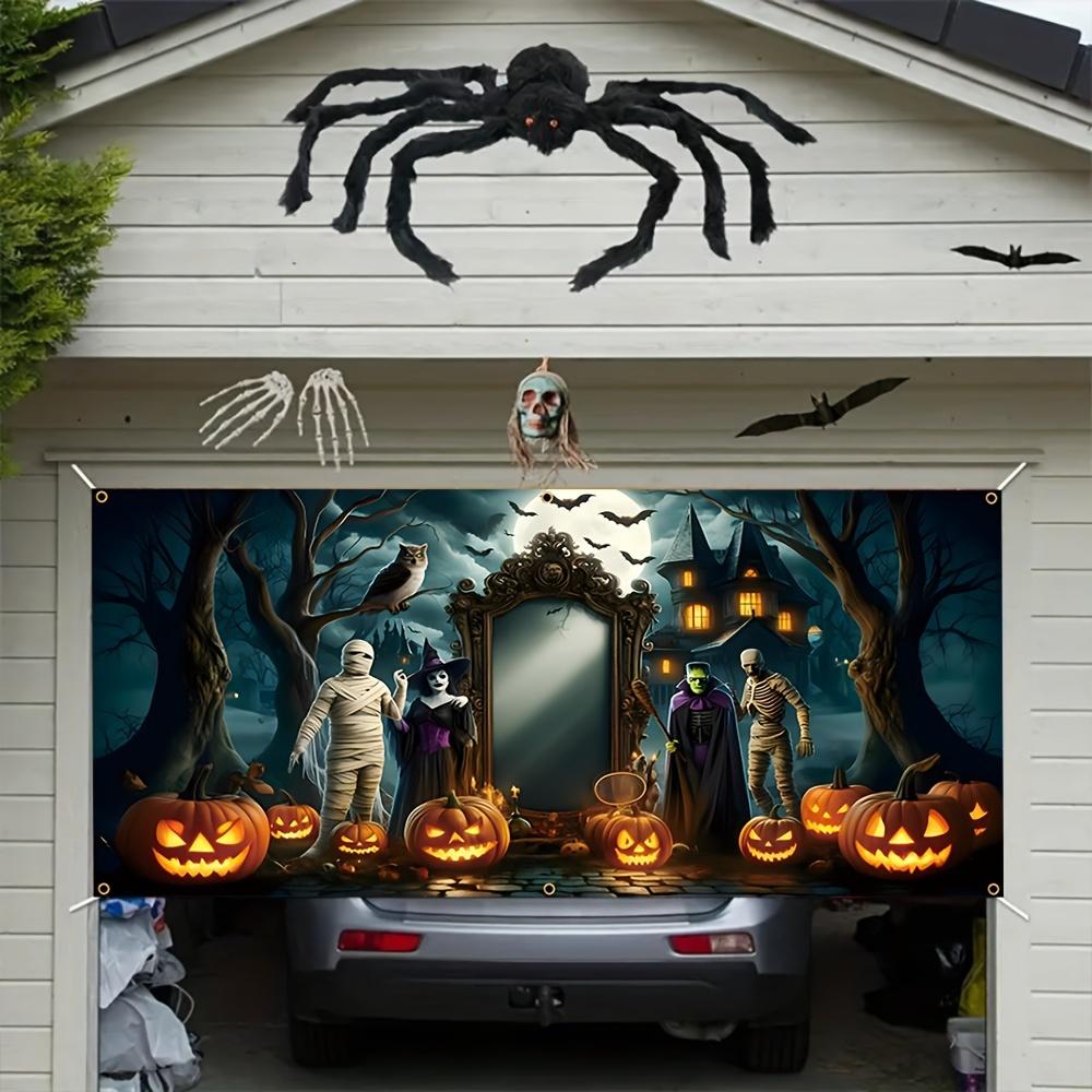 A Halloween garage door banner featuring terrifying bandages monsters witches bats pumpkins owls and dead trees