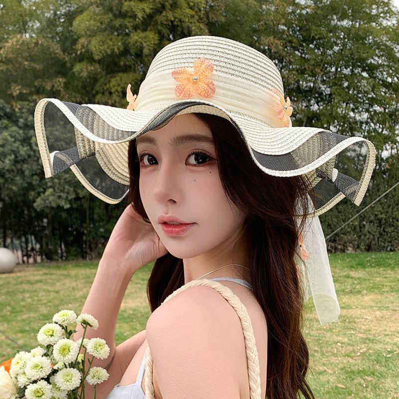 Straw hat women's summer seaside big brim sun hat new outdoor travel leisure wave three-dimensional flower streamer sun hat