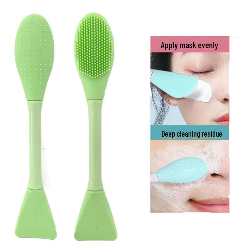 

Силіконова щітка для очищення обличчя та нанесення маски з скребком, подвійного призначення 16.2*3 cm зелений