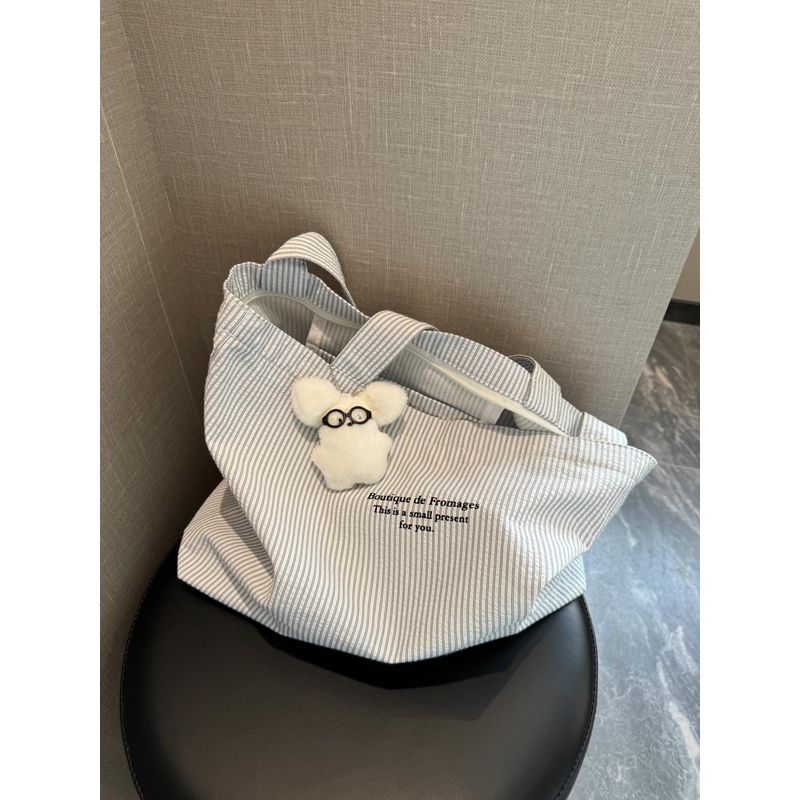 

Korean Style Idle Style Large Capacity Canvas Bag Women s 2025 New Arrival Striped Minimalist All-Match Commute Shoulder Tote Bag Stripes (No pendant)