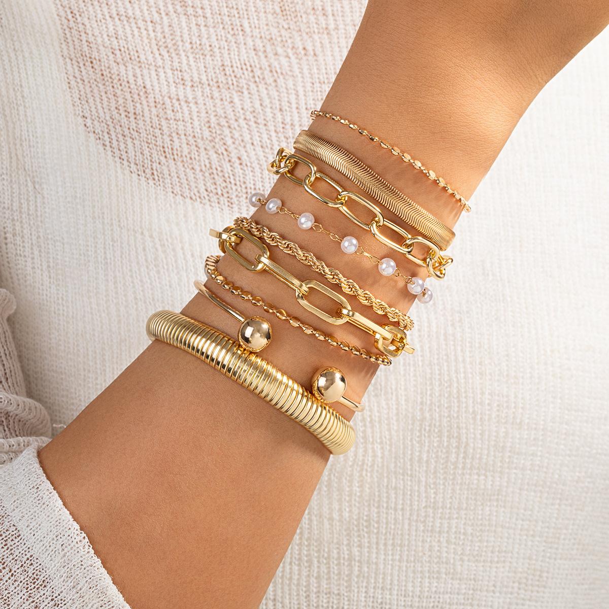 

9-piece geometric thick chain spring bracelet multi piece overlapping Fried Dough Twists chain imitation pearl bracelet set