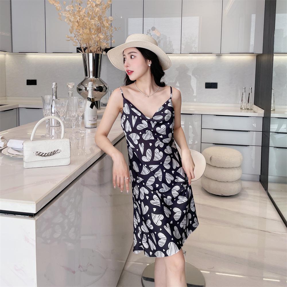 Summer new pajamas women's ice and snow silk thin suspender swing collar pure desire pajamas printed medium and long skirts