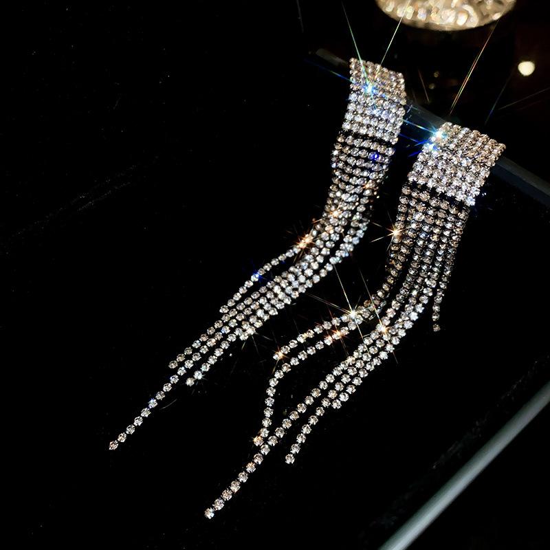 Light luxury style diamond-encrusted long fringed silver needle earrings, European and American niche personalized earrings,