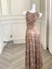 French Retro Sleeveless Plaid Maxi Dress - Elegant Design with Unique Waist-Cinching Style.