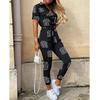 Tuta da Donna Europea e Americana Stampata con Cintura - Pantaloni Lunghi Casual con Revers e Bottoni, Collezione Estate 2026.