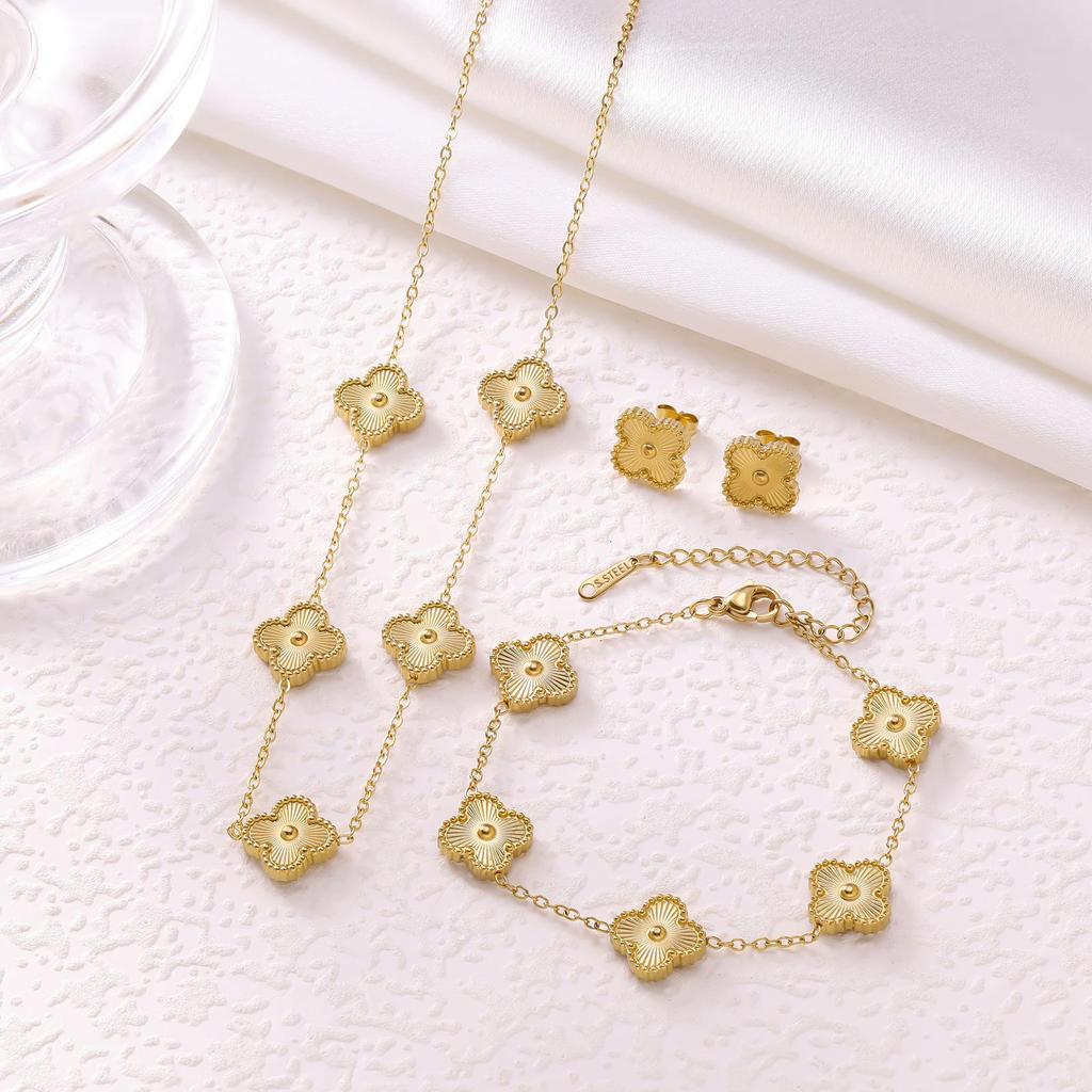 Elegant Four-Leaf Clover Jewelry Set: Titanium Steel Necklace, Earrings, and Bracelet - Light Luxury Design