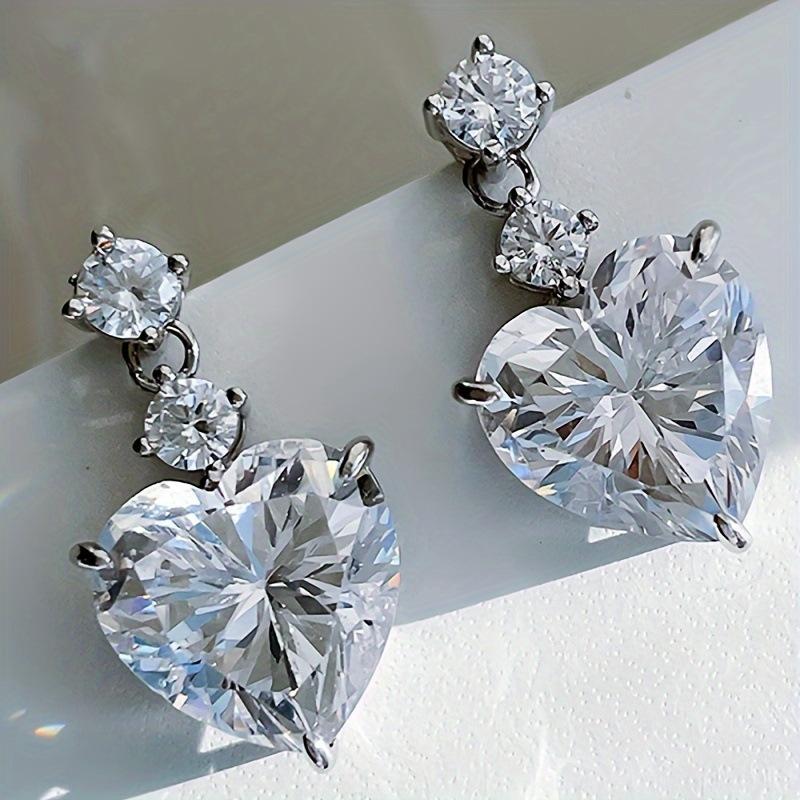 Серебряные серьги-подвески в форме сердца из циркония для женщин — фото 6