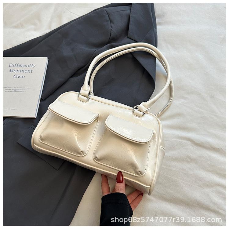 Koreanische Version 2025 neue Pendler-Umhängetasche Nische Achselhöhle große Kapazität Multi-Taschen Nischendesign Tasche für Frauen