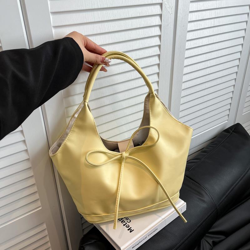 

Korean version of large-capacity shoulder bag women s 2025 summer new red bow tote bag commuter handbag жовтий