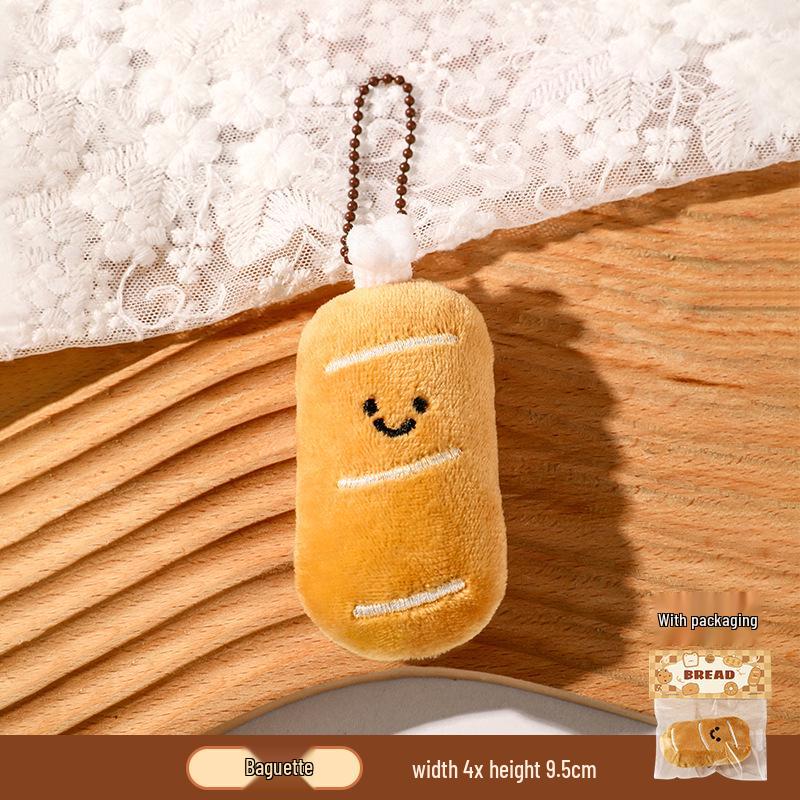 Uroczy breloczek pluszowy croissant - Mała kreskówkowa ozdoba do plecaka