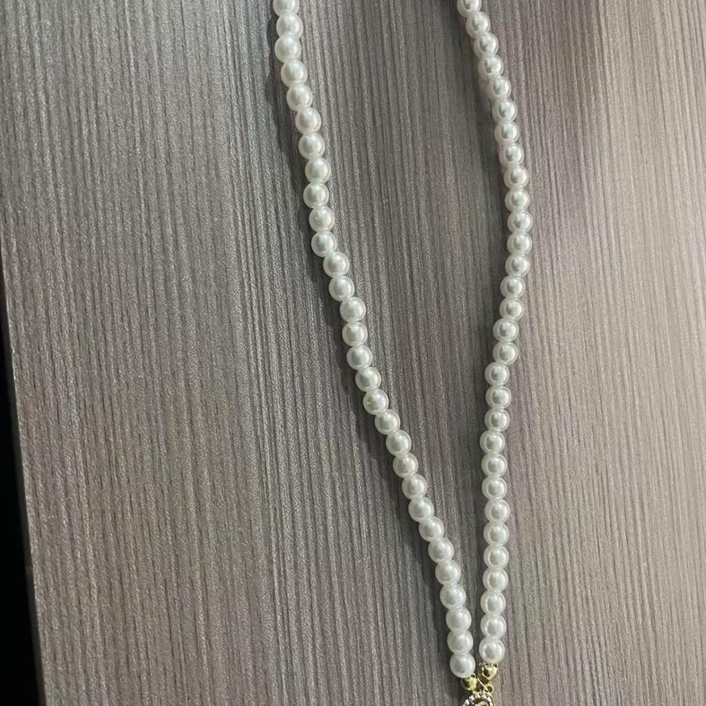 Fashion temperament pearl pendant necklace women's niche design high-end collarbone chain new temperament neck chain