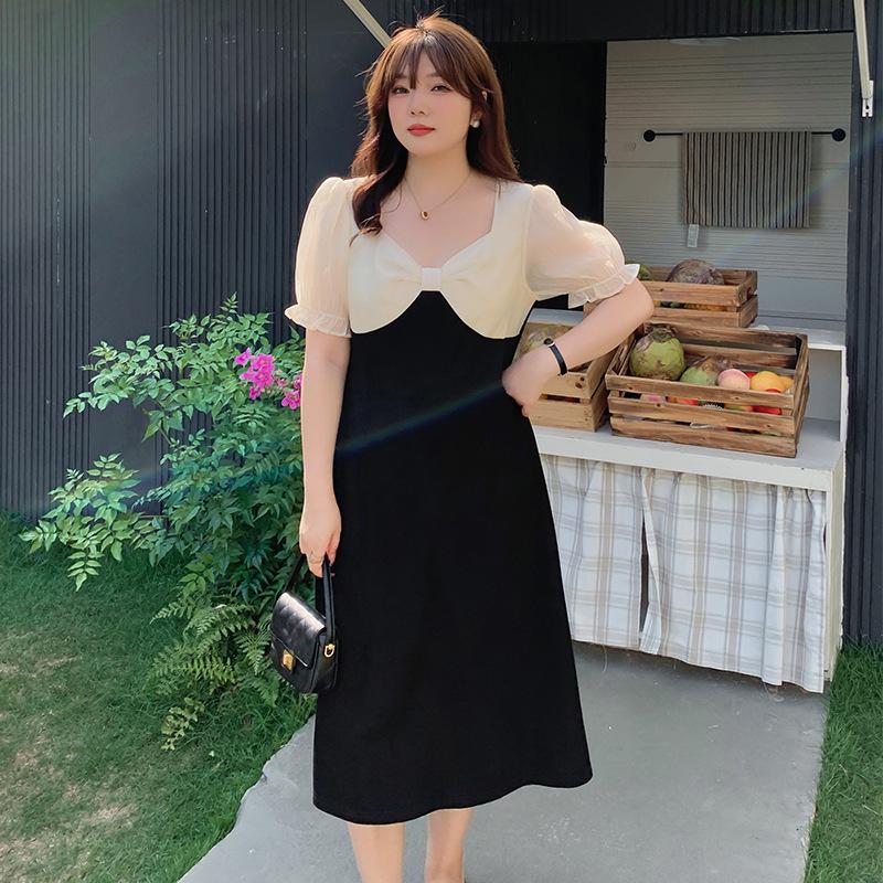 

Женское летнее платье больших размеров с контрастной строчкой и бантом 4XL чёрный/абрикосовый