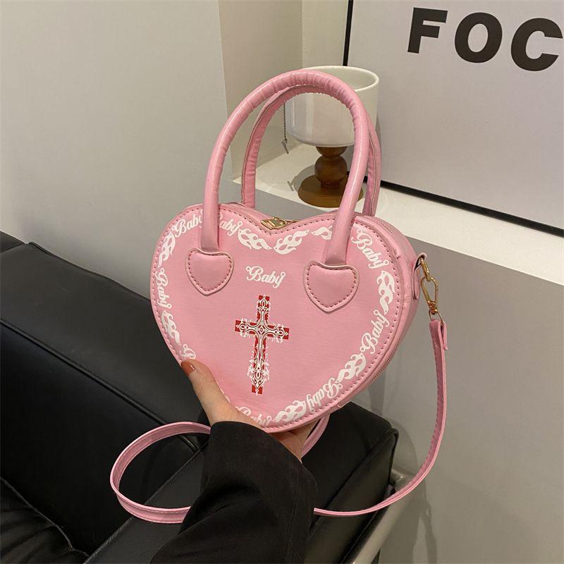 

Personality Mori literature and art 2025 solid color new handbag trend cross single shoulder girl love heart shaped women s bag