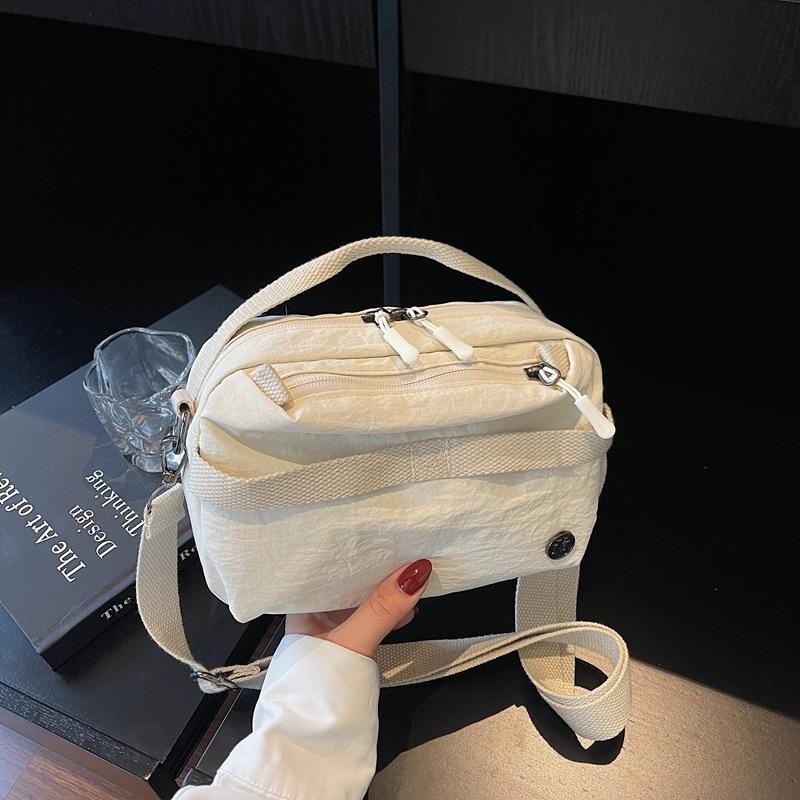 

Niche design waterproof Oxford cloth small square bag casual messenger bag versatile bag shoulder bag lightweight mobile phone bag белый