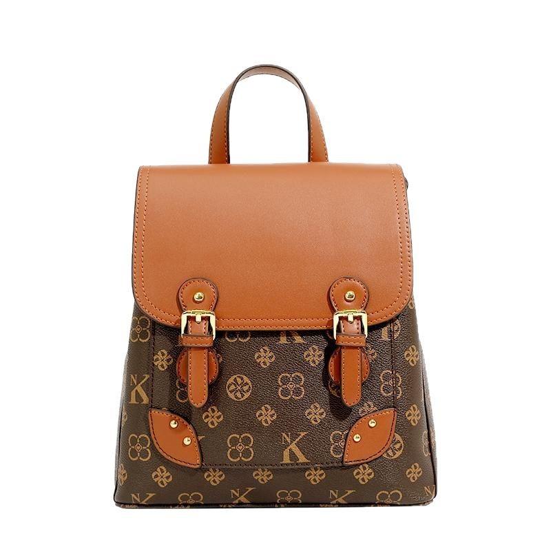 Guangzhou Rucksack aus echtem Leder Damen Neu Herbst und Winter Modisch Vintage Blume Große Kapazität Rucksack Vielseitig Lässig Reise Tasche