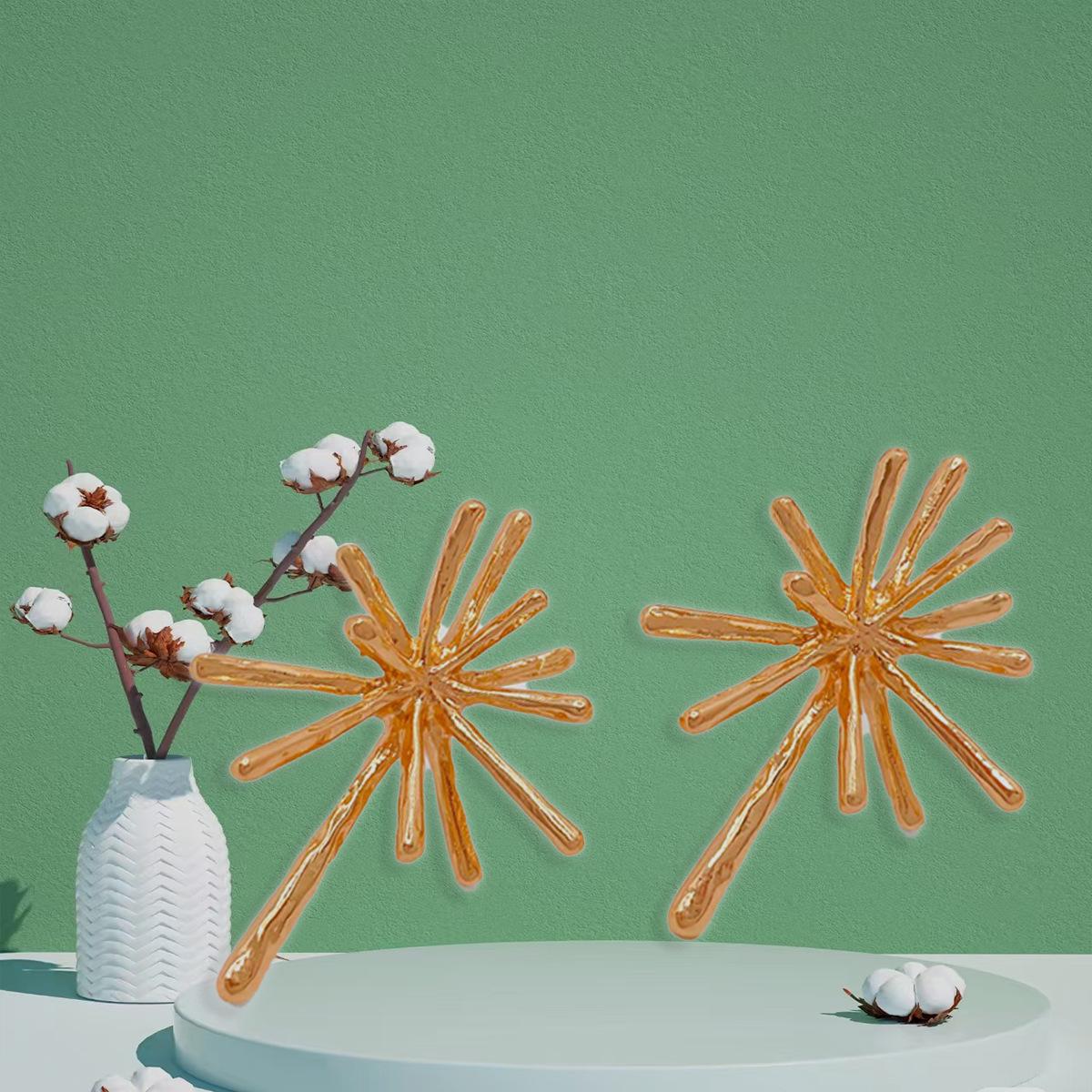 A pair of sea urchin-shaped alloy stud earrings, personalized fireworks shape metal high-end stud earrings