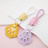 Creative Pet Hair Storage Keychain with Dog Paw Pendant for Shedding Cat and Dog Hair.