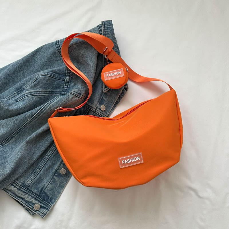 Fashionable And Minimalistic Dumpling Bag For Women Spacious Shoulder Bag Available In Black White Green Red Orange And Pink