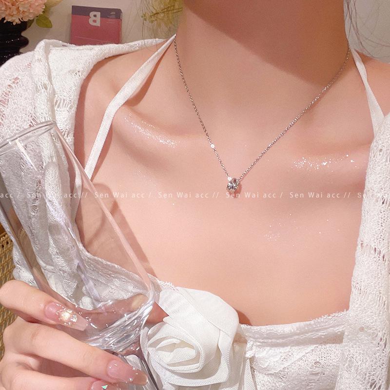 Hochwertige vielseitige koreanische Silber-Titan-Halskette mit Perlen-Schmetterlingsanhänger für Damen