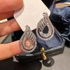 Celebrity high-end stud earrings for women, water drop hollow design stud earrings, light luxury urban trend