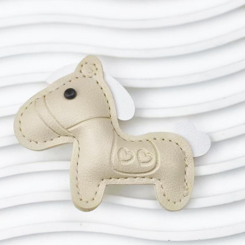 

Spot pony pendant leather embossing money soon bag accessories Year of the Horse car keychain pendant accessories Ordinary style