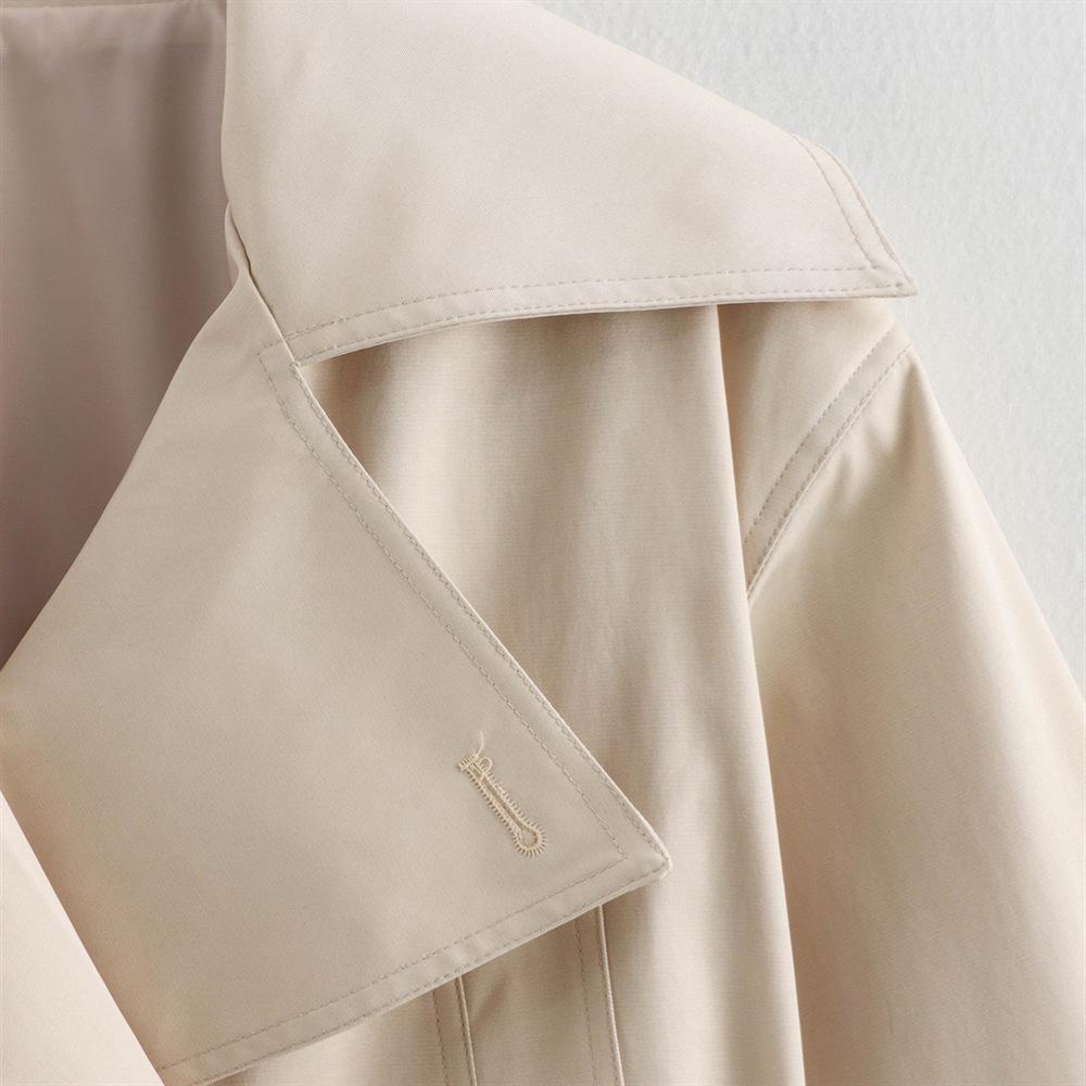 Dámský slim trenčkot s dlouhým rukávem a páskem v pase, jaro 2025