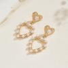 European and American casual sweet love pearl earrings light luxury high-end temperament versatile hollow love stud earrings women