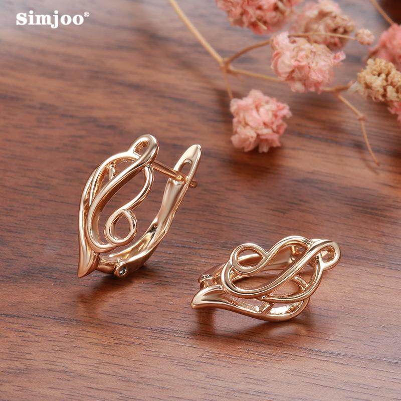

SIMJOO Модные женские серьги из розового золота с простыми и элегантными серьгами с полыми цветами