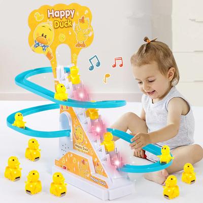 Traccia musicale leggera Charm Regalo per bambini interessante Maialino che sale le scale Scatola colorata Ragazzi e ragazze Giocattoli elettrici Giocattolo puzzle anatra