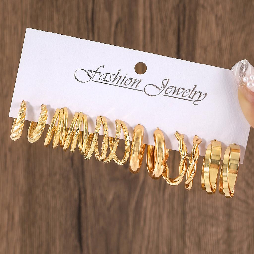 European and American new earrings set 1 pair of golden metal twist pearls creative retro simple and versatile earrings