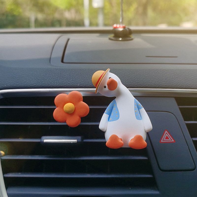 Auto Perfume Aromatherapy Cute Cheering Duck Head Tilt Duck Air Conditioner Air Outlet Clip Car Interior Ornaments Ins Fragrant Stone