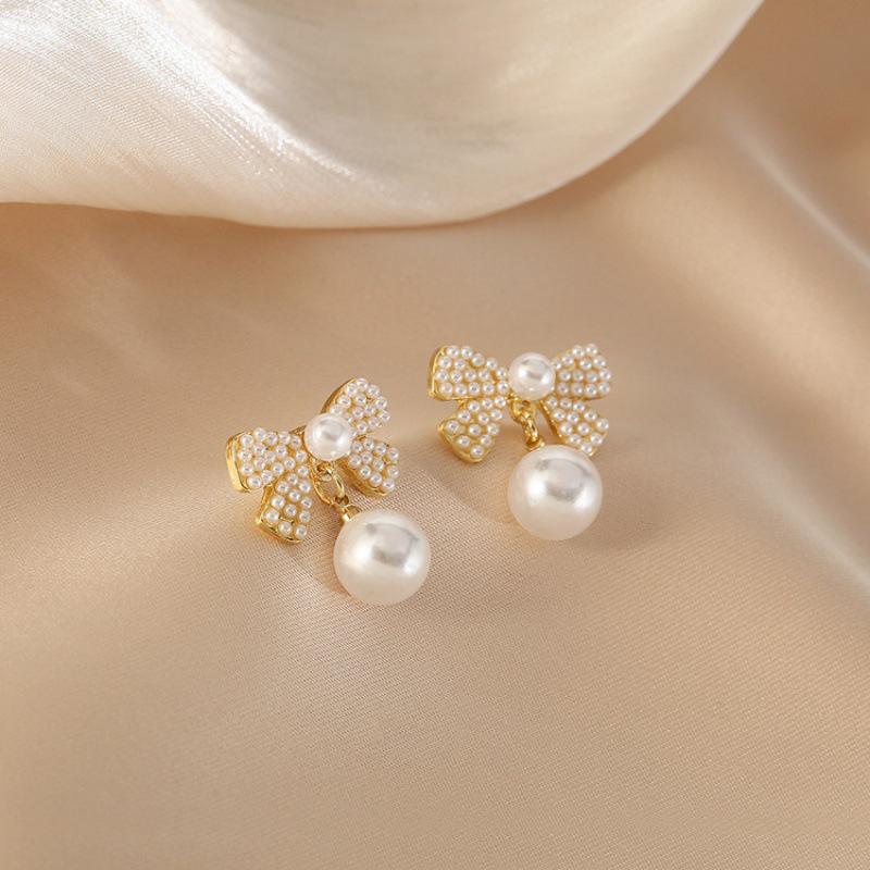 S925 Sterling Silver Pearl Bowknot Stud Earrings - 2023 Fashion Trend