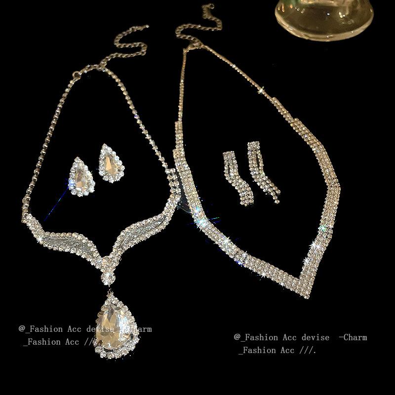 Diamond-encrusted water drop geometric necklace earrings set light luxury high-end collarbone chain fashionable versatile temperament jewelry